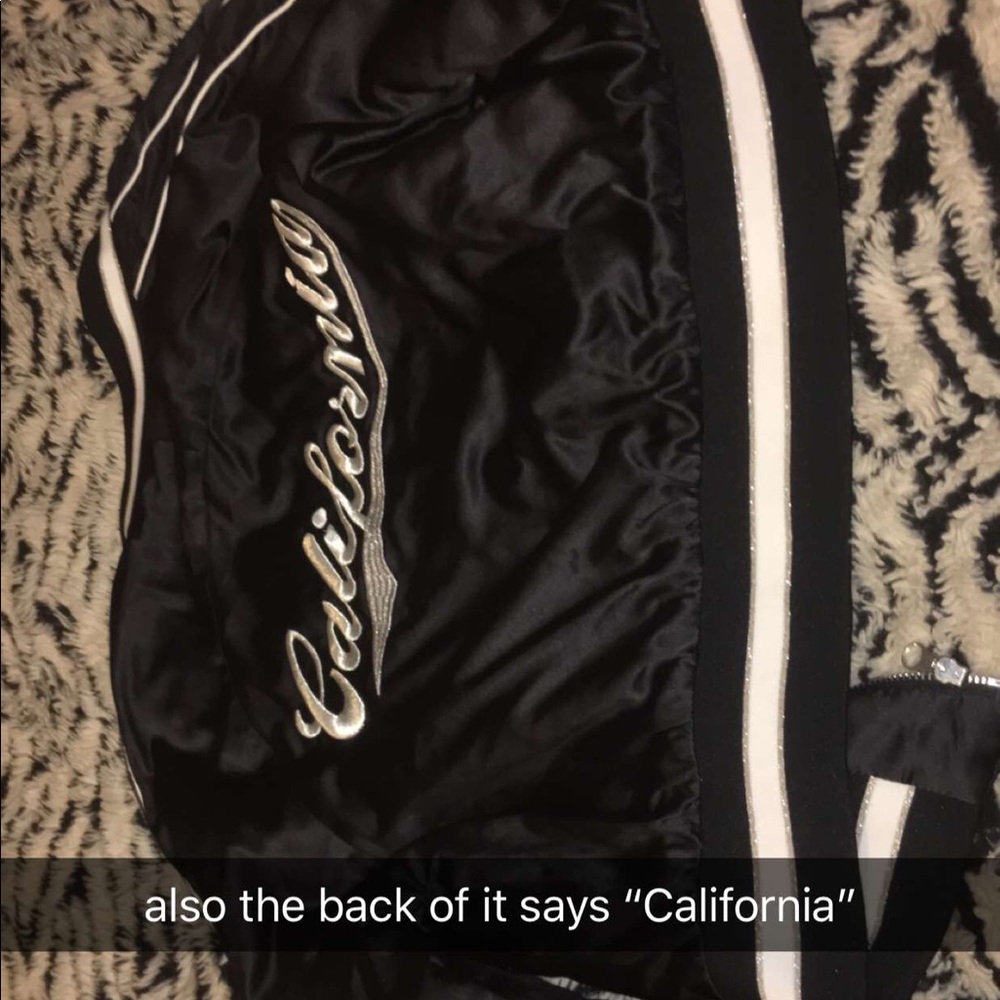 A cute cropped silky jacked